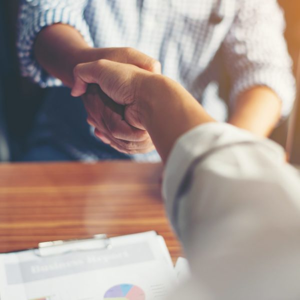 Business People Handshake Greeting Deal at work. Business People Handshake Greeting Deal at work.